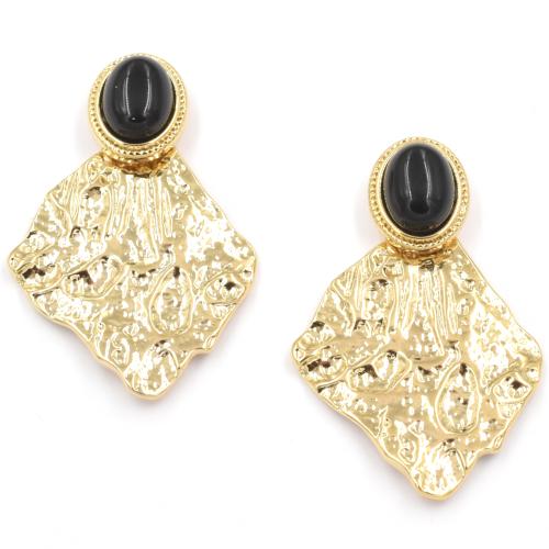 Boucles d'oreilles ZAG feuille dorée et Pierre Onyx noire